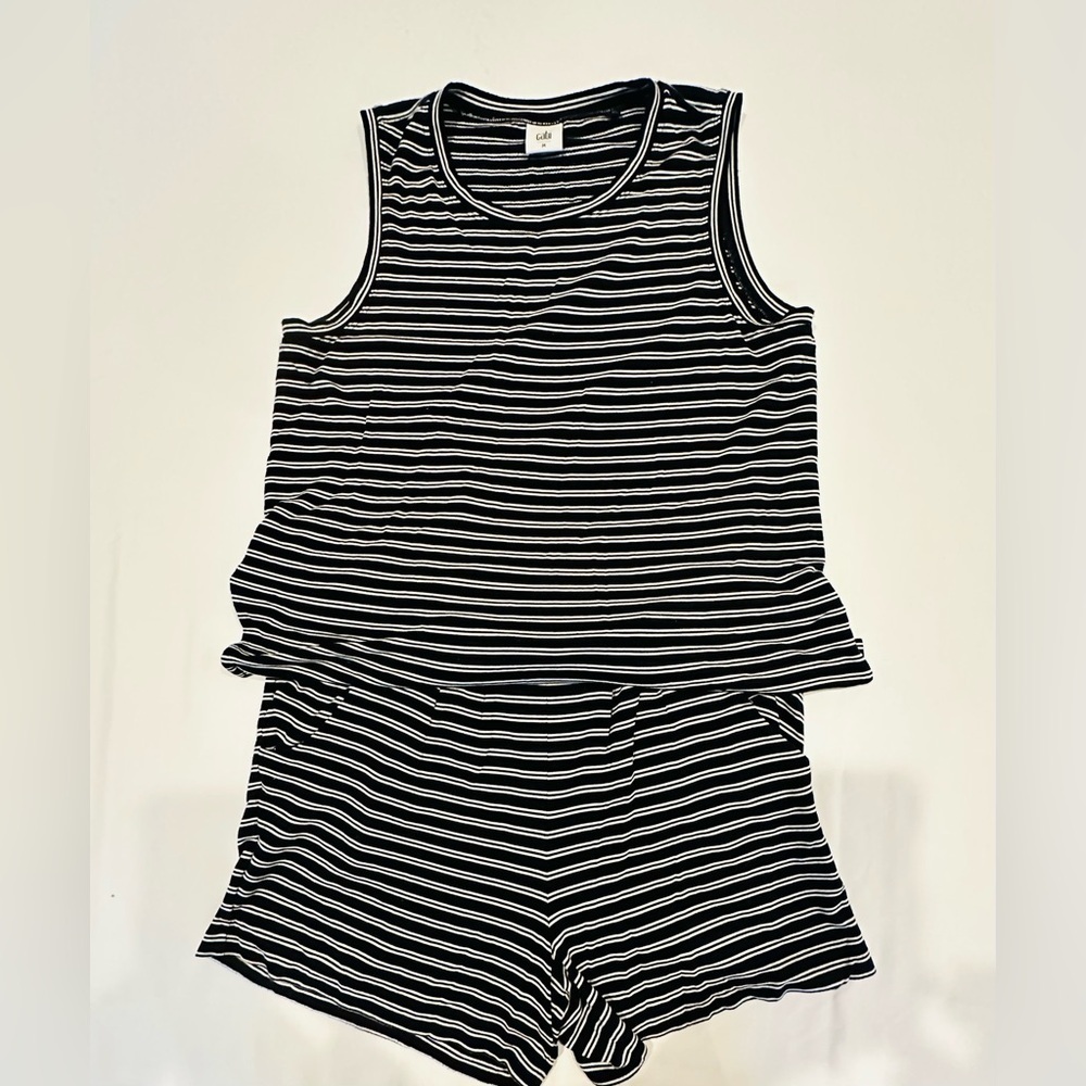 Cabi one pc short and top, baggy top, side pockets on shorts, very comfortable!